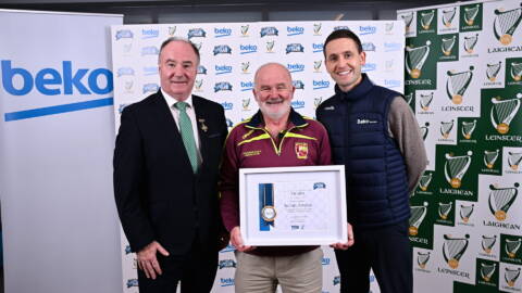 Kevin Jordan of Southern Gaels GAA Club, Athlone, Westmeath, receiving his award from Cathaoirleach Comhairle Laighean Derek Kent, left, and Beko Ireland Marketing Manager Shane O'Connor 