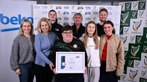Finn Brophy of Palatine GAA Club, Carlow, has been chosen as the 2025 winner in the Leinster GAA Beko Club Champion awards. Finn is pictured with his family, after receiving his award from Beko Ireland Marketing Manager Shane O'Connor 